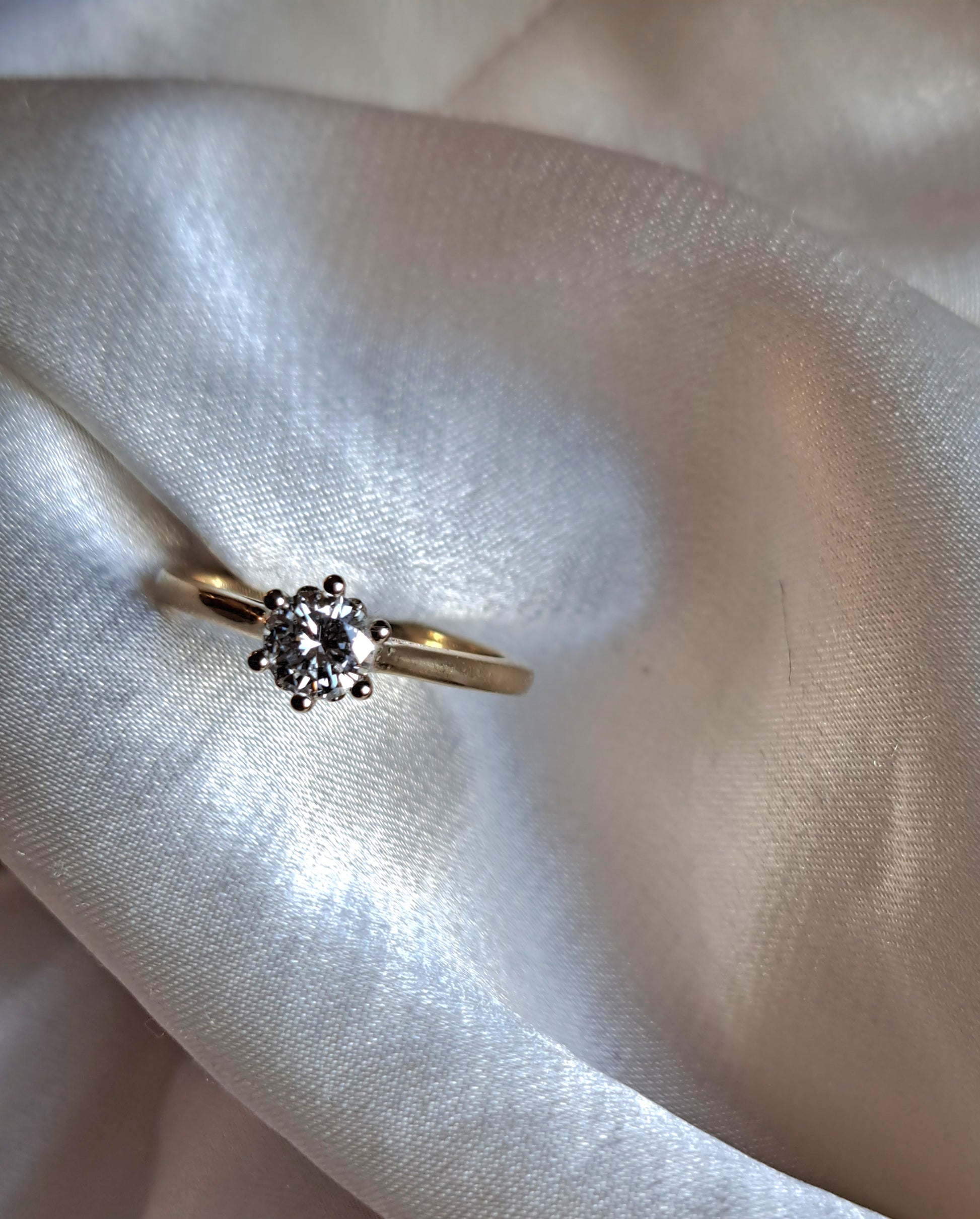 Moissanite solitaire ring