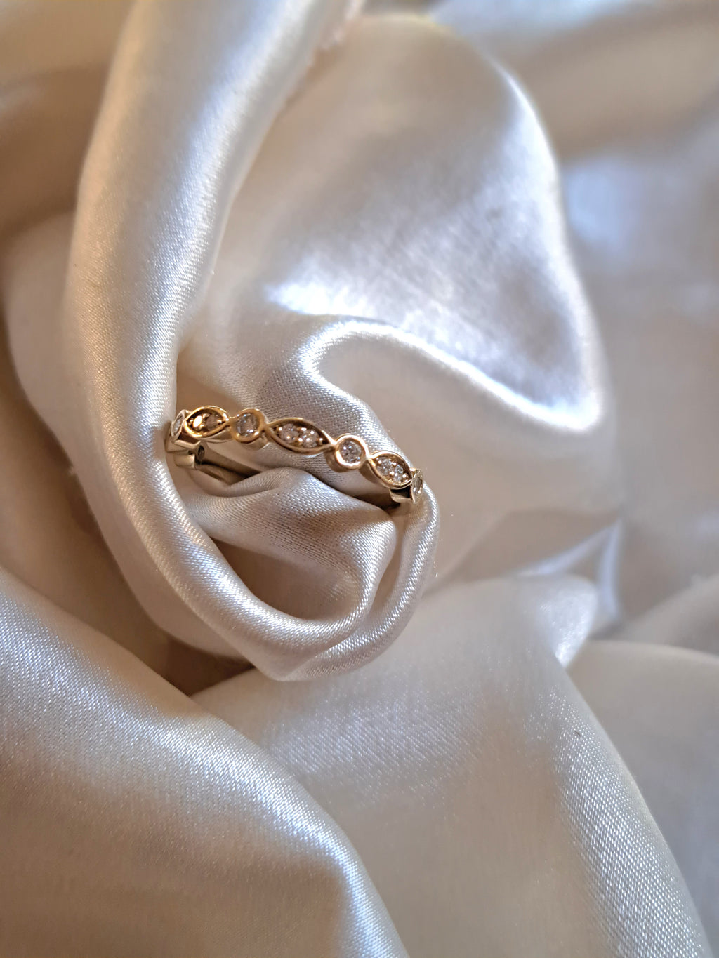 2mm Round diamond and 1.3mm round diamond half eternity band.