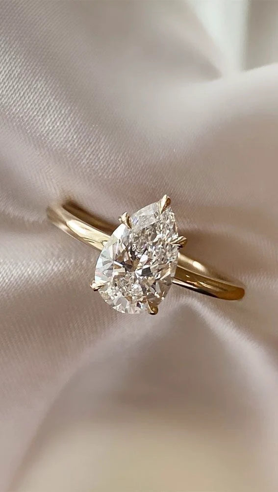 Pear shape solitaire ring