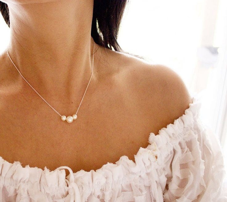 Three pearl necklace