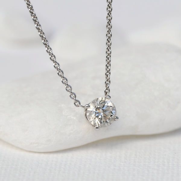 Floating moissanite and silver necklace