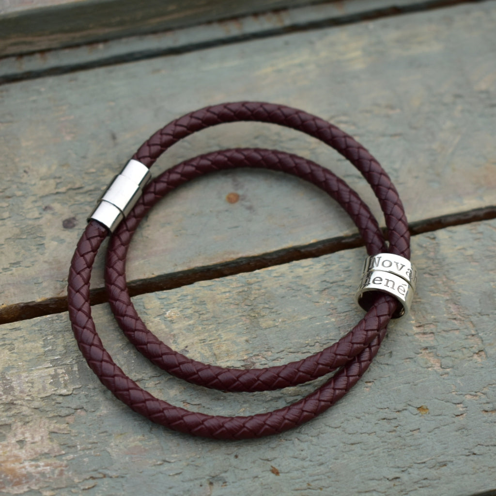 Braided leather bracelet with name rings