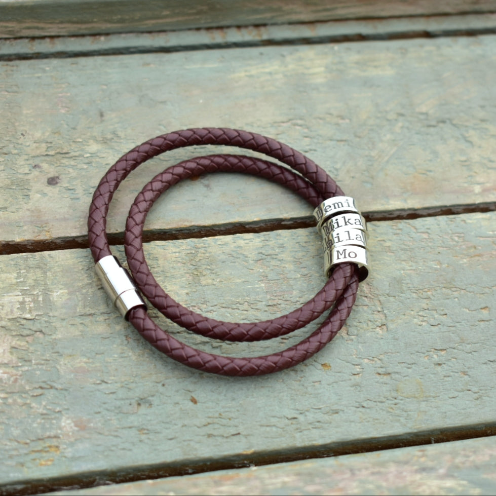 Braided leather bracelet with name rings
