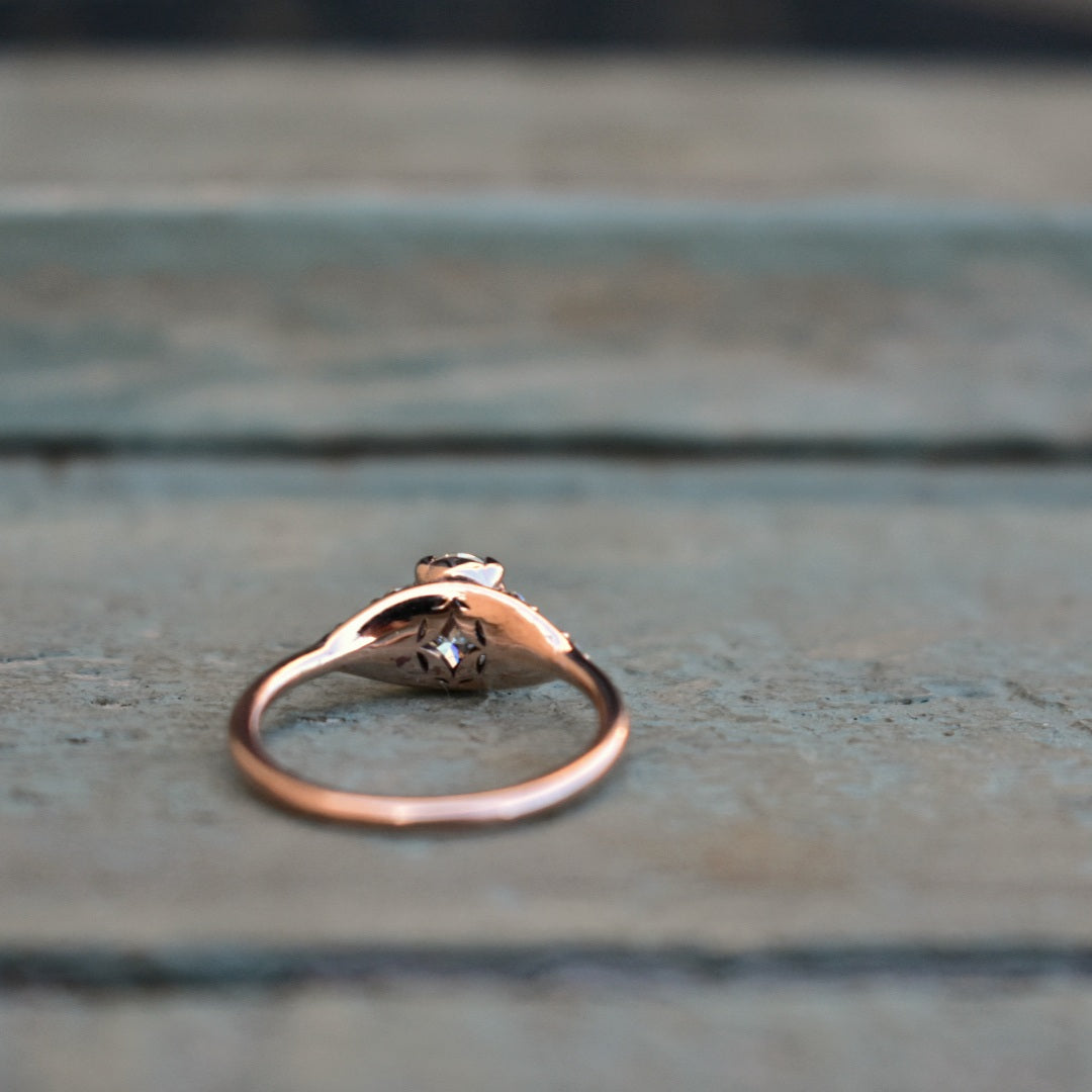 Oval moissanite rose gold ring
