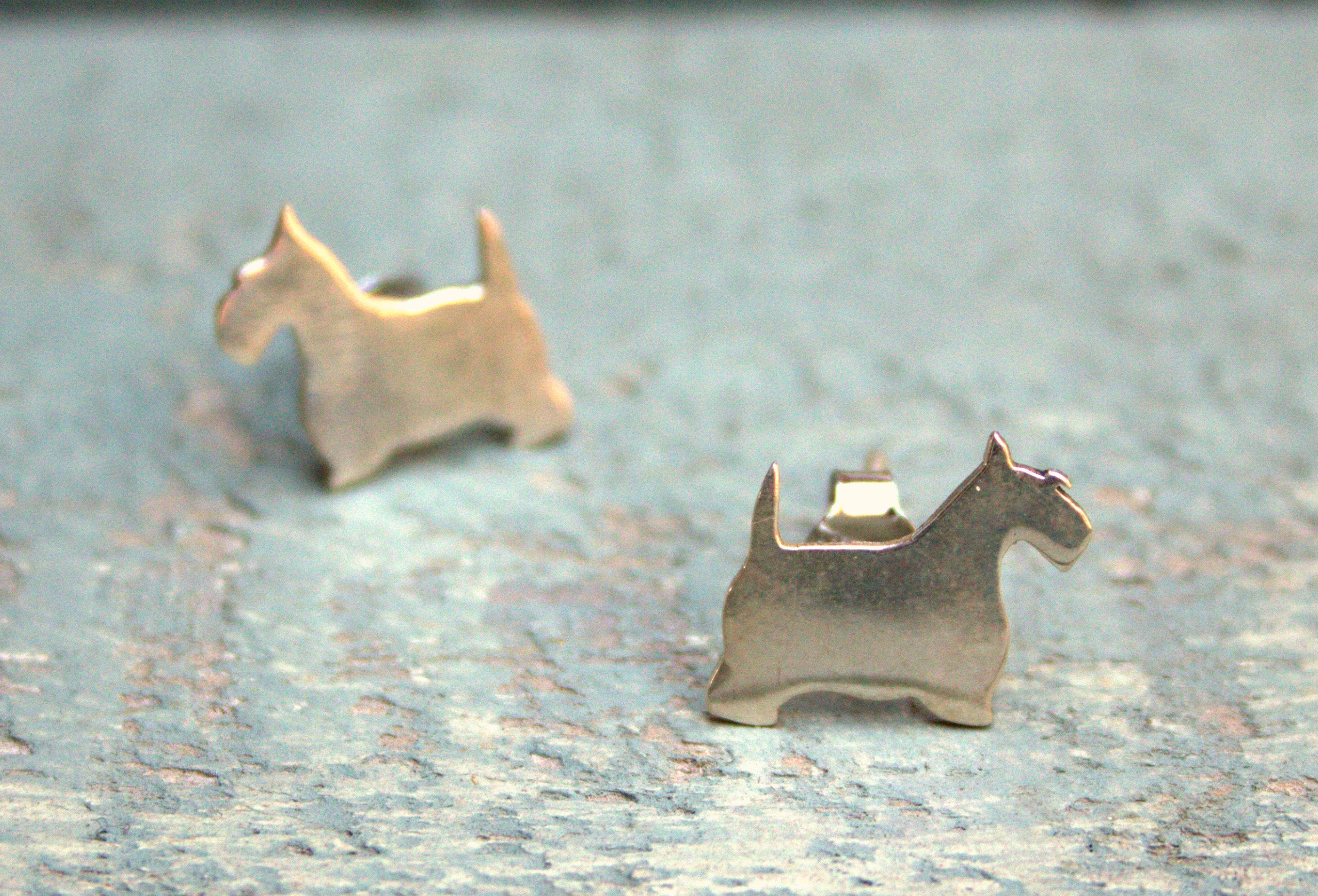 Sterling silver scotty stud earrings.