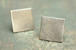 Sterling silver square studs available in a 12mm or 16mm square with a matt or polished finish.  Please note all pieces are made on order by Erfdeel Juwele. Allow up to one week for manufacture.