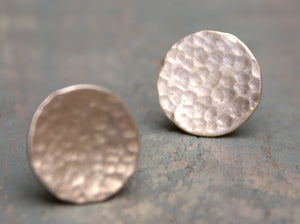 Sterling silver hammered disc studs available in a 12mm or 16mm disc.  Please note all pieces are made on order by Erfdeel Juwele. Allow up to a week for manufacture.