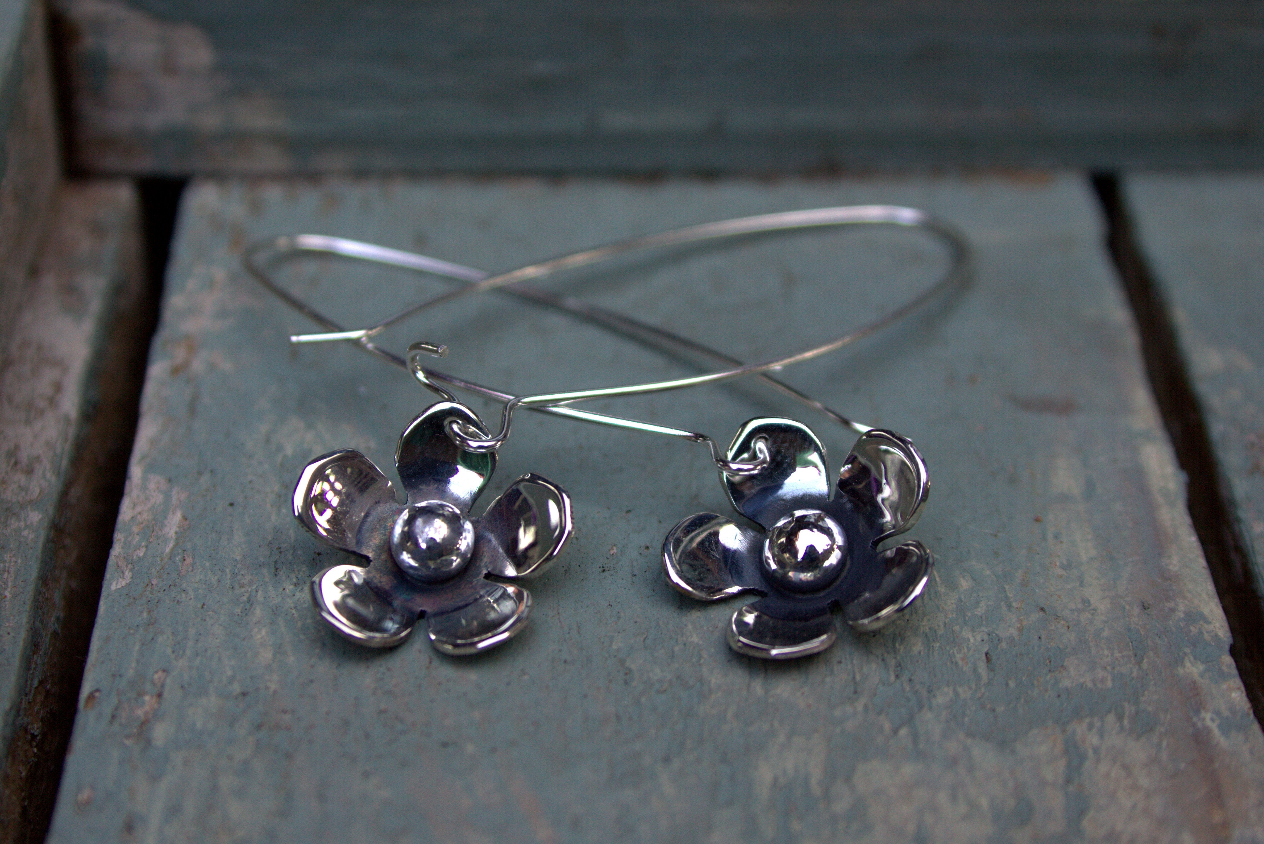 Large sterling silver daisies on long hooks.  Please note all pieces are made on order by Erfdeel Juwele. Allow up to a week for manufacture.