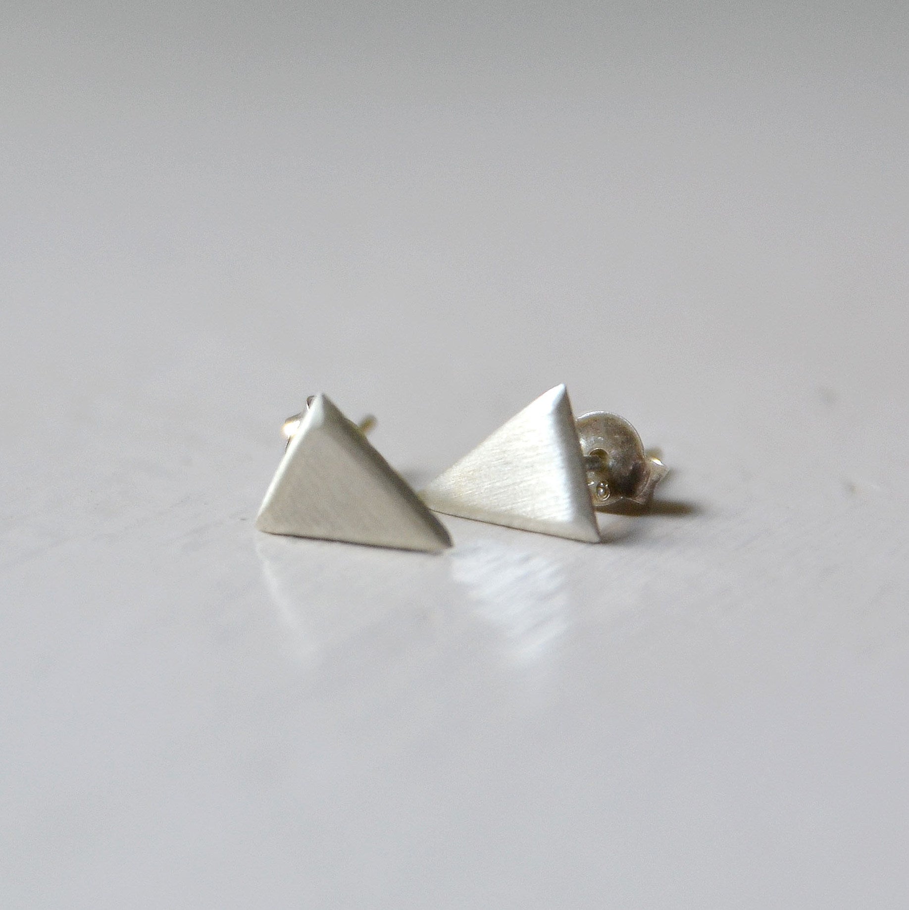 Sterling silver triangle studs.  Please note all pieces are made on order by Erfdeel Juwele. Allow up to one week for manufacture.
